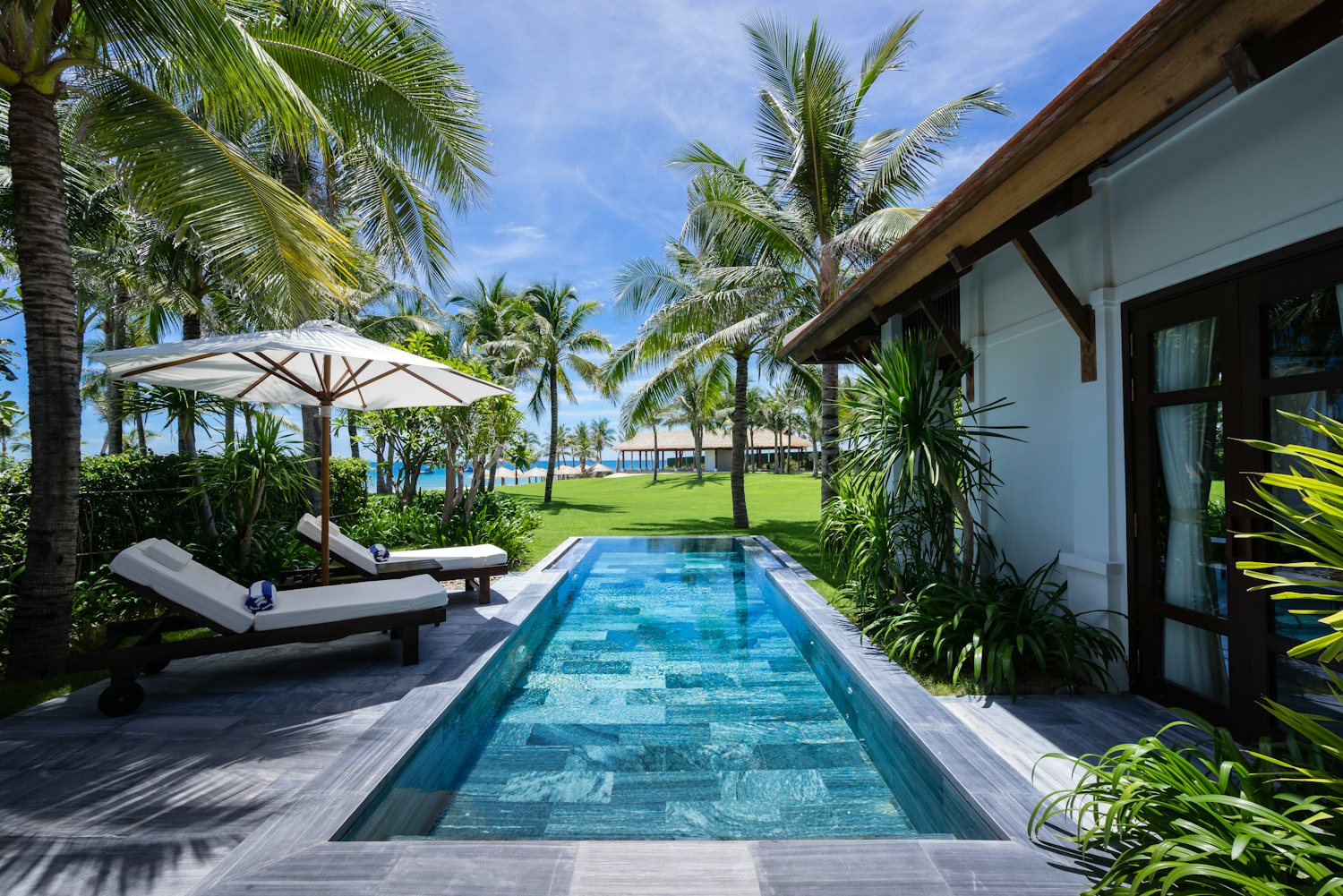 Pool View Room — the quiet garden pool seen from the room's window